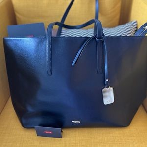 Tumi Tote bag. Expertly crafted from buttery soft leather.